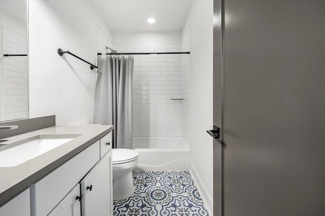 full bathroom featuring toilet, shower / tub combo, and vanity