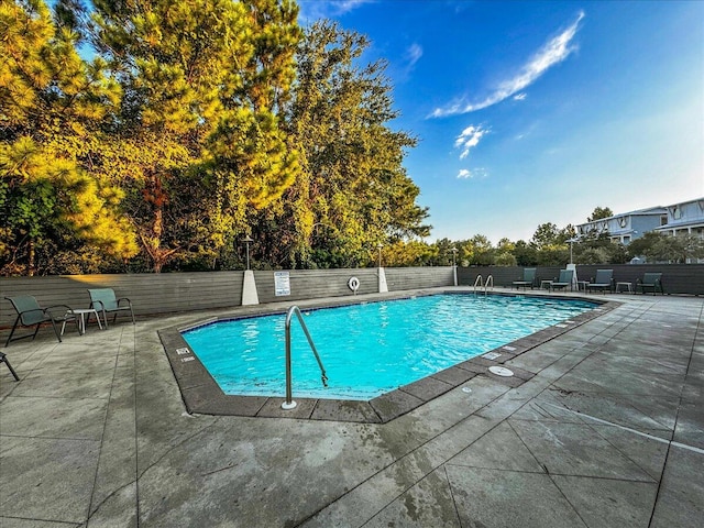 view of pool with a patio area