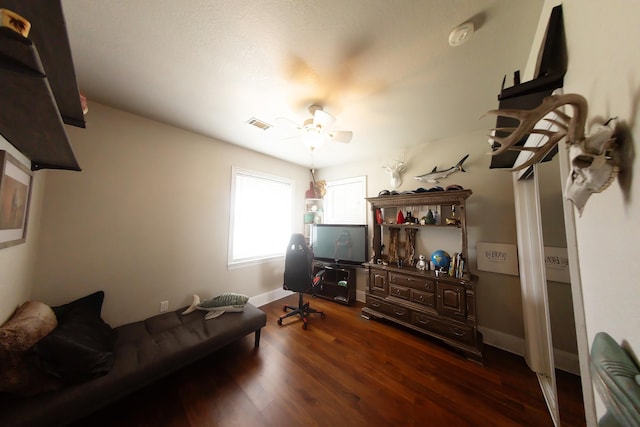 living room with dark hardwood / wood-style floors