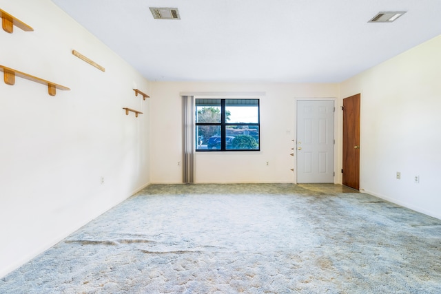 spare room with carpet floors