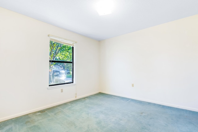 empty room featuring carpet floors