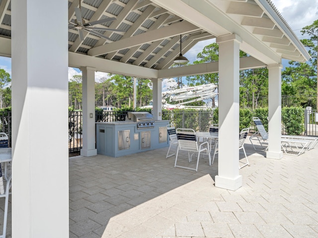 218 White Cottage Rd, Santa Rosa Beach, FL 32459 - view of patio with area for grilling, a ceiling fan, a gazebo, exterior kitchen, and outdoor dining space