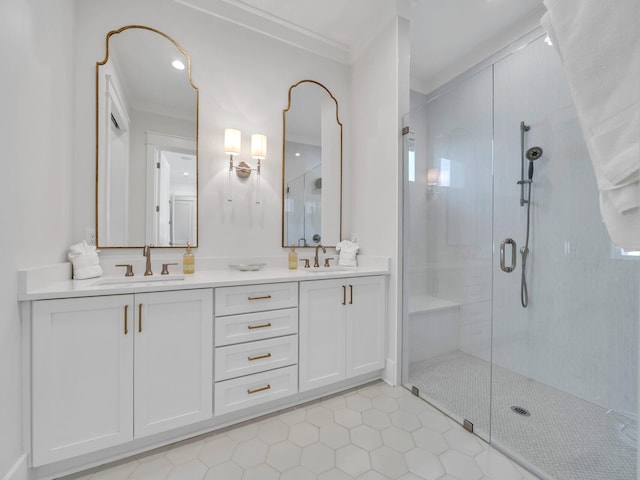 218 White Cottage Rd, Santa Rosa Beach, FL 32459 - bathroom with a shower stall, crown molding, double vanity, and a sink