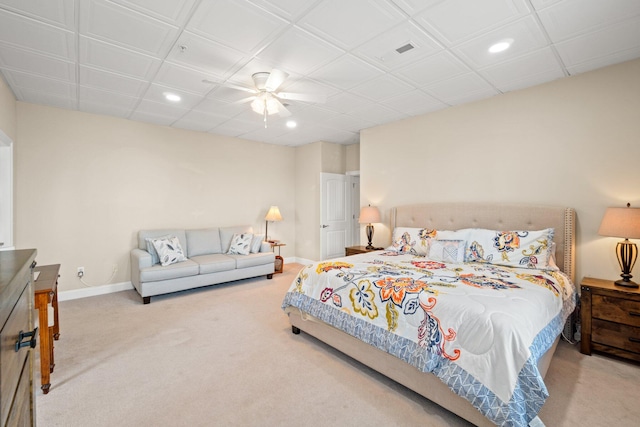 carpeted bedroom with ceiling fan