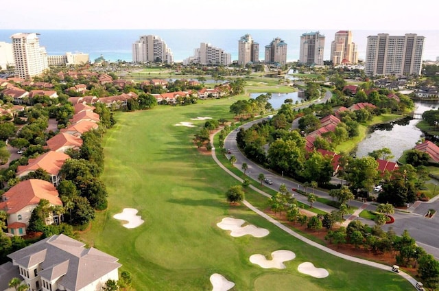 bird's eye view with a water view