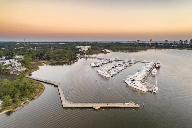 aerial view at dusk with a water view