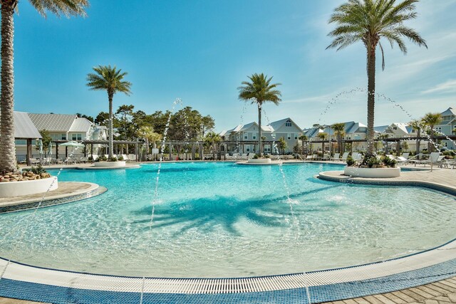 view of pool featuring pool water feature