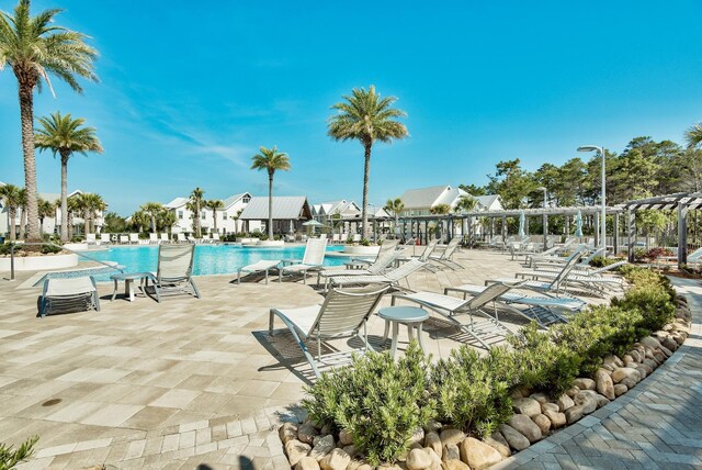 view of swimming pool featuring a patio