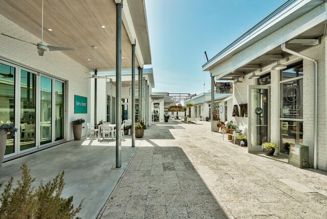 view of patio / terrace featuring ceiling fan