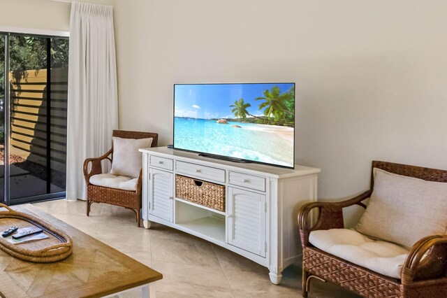 living area featuring light tile patterned floors