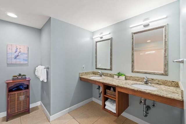 bathroom with vanity and tile patterned floors