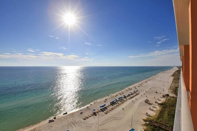 property view of water featuring a beach view