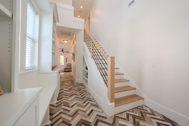 stairway with parquet flooring