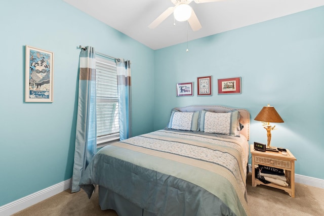 bedroom with ceiling fan and carpet floors