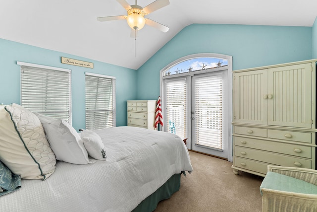 bedroom with vaulted ceiling, ceiling fan, light colored carpet, and access to exterior