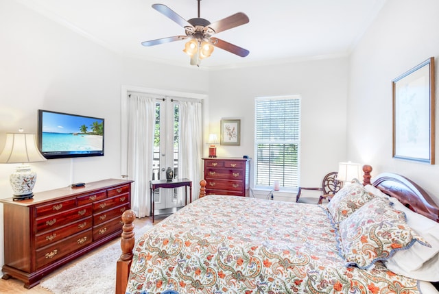 bedroom with ornamental molding, access to outside, light hardwood / wood-style floors, and ceiling fan