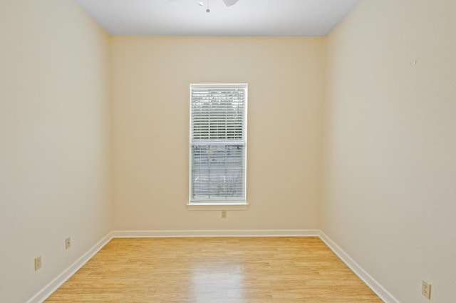 2252 Crystal Cove Ln Unit 2252, Miramar Beach, FL 32550 - unfurnished room featuring light wood-style flooring, a ceiling fan, and baseboards