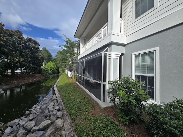 2252 Crystal Cove Ln Unit 2252, Miramar Beach, FL 32550 - view of side of property featuring a balcony and stucco siding
