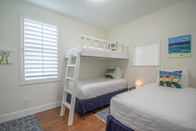 bedroom featuring wood-type flooring