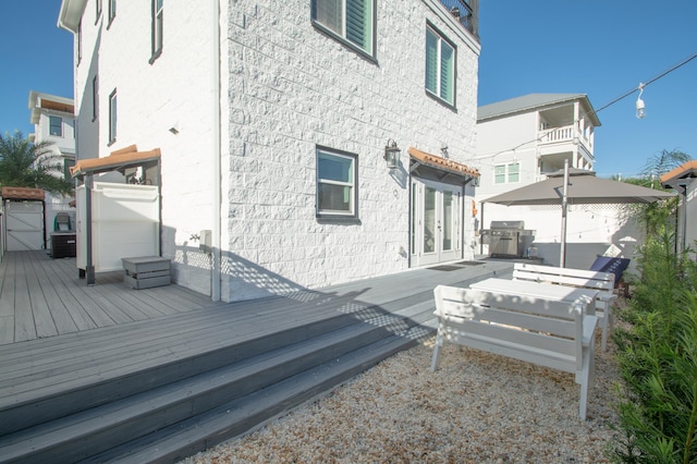 rear view of house with a deck