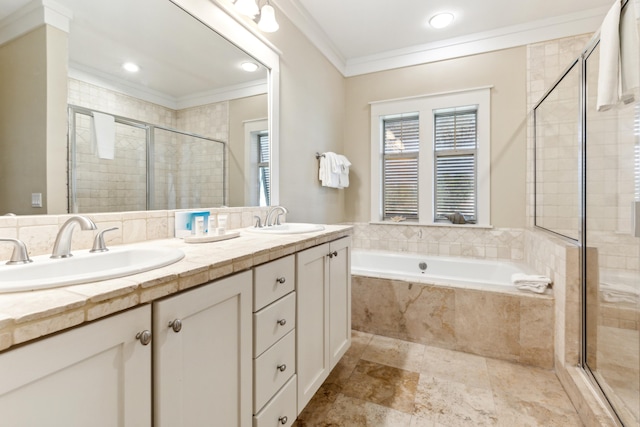 bathroom with independent shower and bath, vanity, and ornamental molding