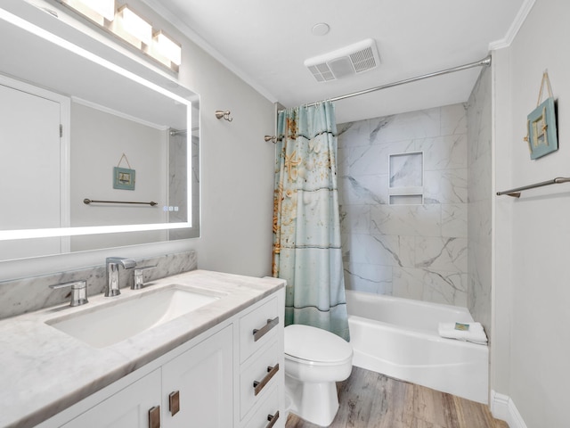 full bathroom with shower / tub combo, hardwood / wood-style floors, ornamental molding, vanity, and toilet