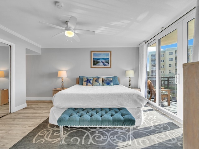 bedroom with ceiling fan, ornamental molding, light hardwood / wood-style floors, and access to exterior