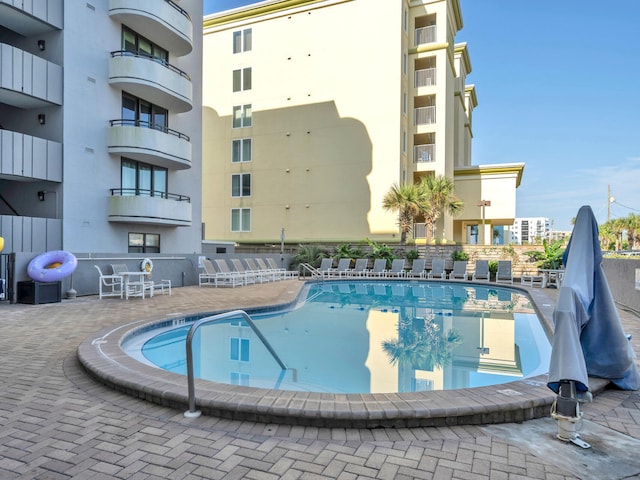 view of pool with a patio area