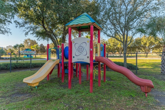 view of play area featuring a lawn