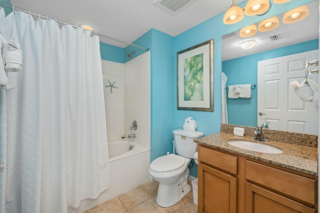 full bathroom with tile patterned flooring, vanity, shower / bath combo, and toilet