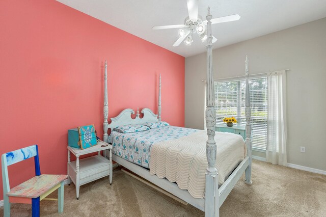 bedroom featuring ceiling fan and carpet