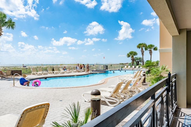 view of swimming pool featuring a patio