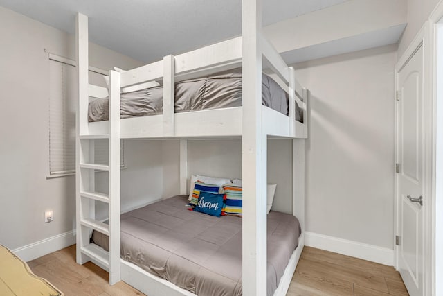 1150 Santa Rosa Blvd Unit 110, Fort Walton Beach, FL 32548 - bedroom with hardwood / wood-style flooring