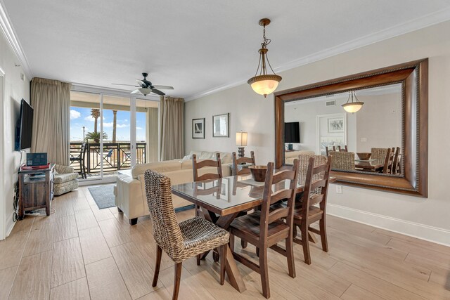 1150 Santa Rosa Blvd Unit 110, Fort Walton Beach, FL 32548 - dining area with light hardwood / wood-style floors, ceiling fan, expansive windows, and crown molding