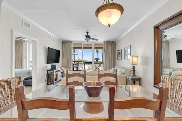 1150 Santa Rosa Blvd Unit 110, Fort Walton Beach, FL 32548 - dining space featuring ceiling fan and ornamental molding