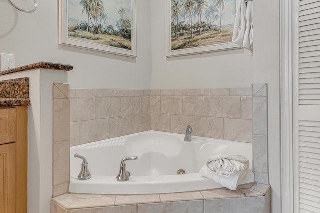 1150 Santa Rosa Blvd Unit 110, Fort Walton Beach, FL 32548 - bathroom featuring a relaxing tiled tub