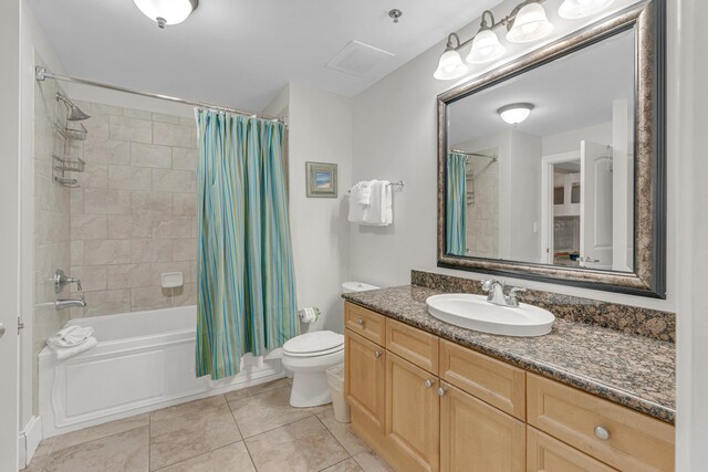 1150 Santa Rosa Blvd Unit 110, Fort Walton Beach, FL 32548 - full bathroom featuring shower / bathtub combination with curtain, tile patterned flooring, vanity, and toilet