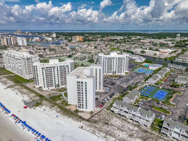 aerial view featuring a water view and a view of the beach