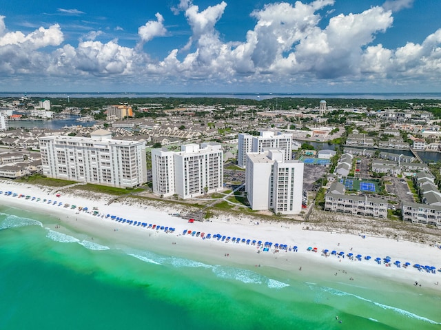 bird's eye view with a water view and a view of the beach