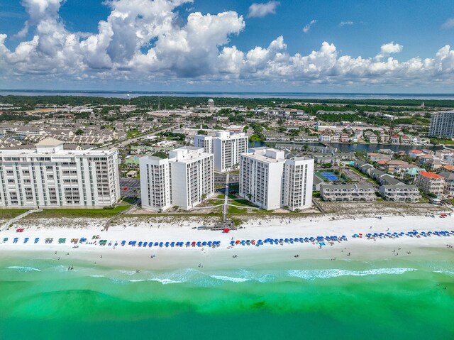 drone / aerial view with a view of the beach and a water view