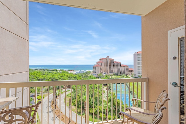 balcony featuring a water view