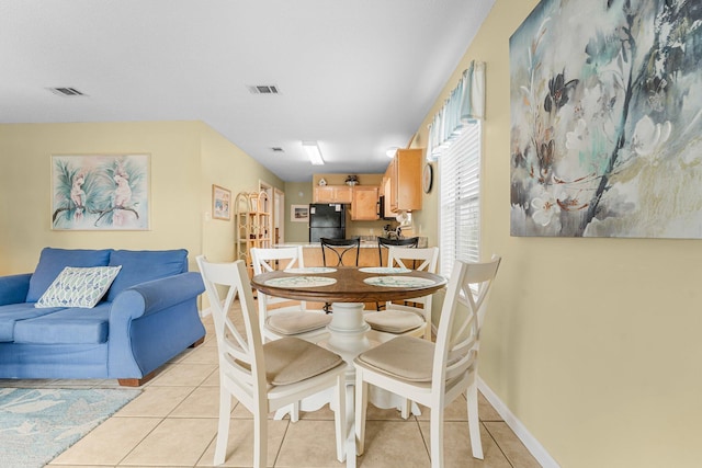 dining room with light tile patterned floors