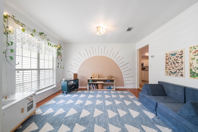 living area featuring hardwood / wood-style floors