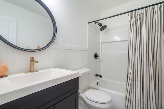 full bathroom with shower / tub combo, vanity, and toilet