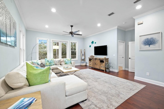 living room featuring crown molding, ceiling fan, and dark wood-type flooring