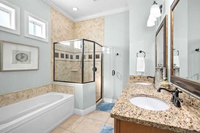 bathroom with tile patterned floors, vanity, separate shower and tub, and ornamental molding