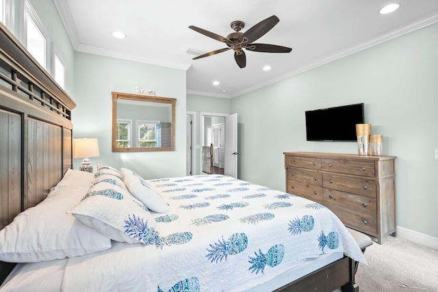 bedroom with carpet, ceiling fan, and crown molding