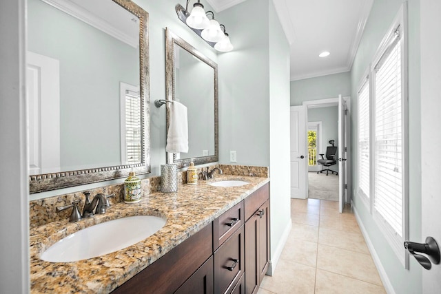 bathroom featuring tile patterned floors, vanity, and crown molding