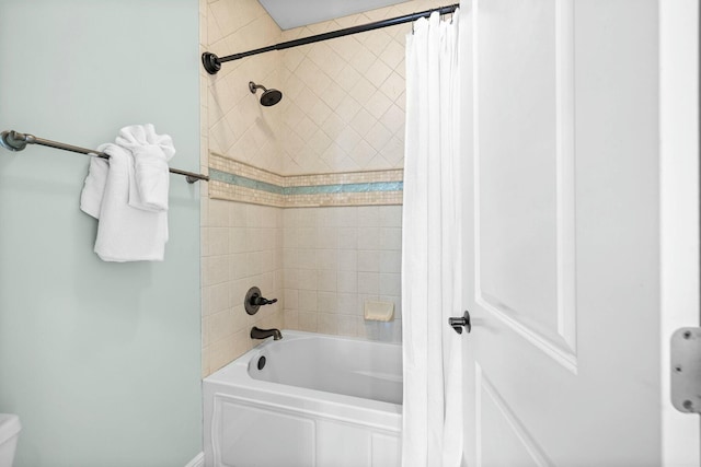 bathroom with shower / bath combo