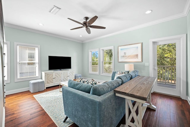 living room with ceiling fan, dark hardwood / wood-style flooring, and crown molding